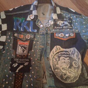 Punk jacket with handmade patches and pins